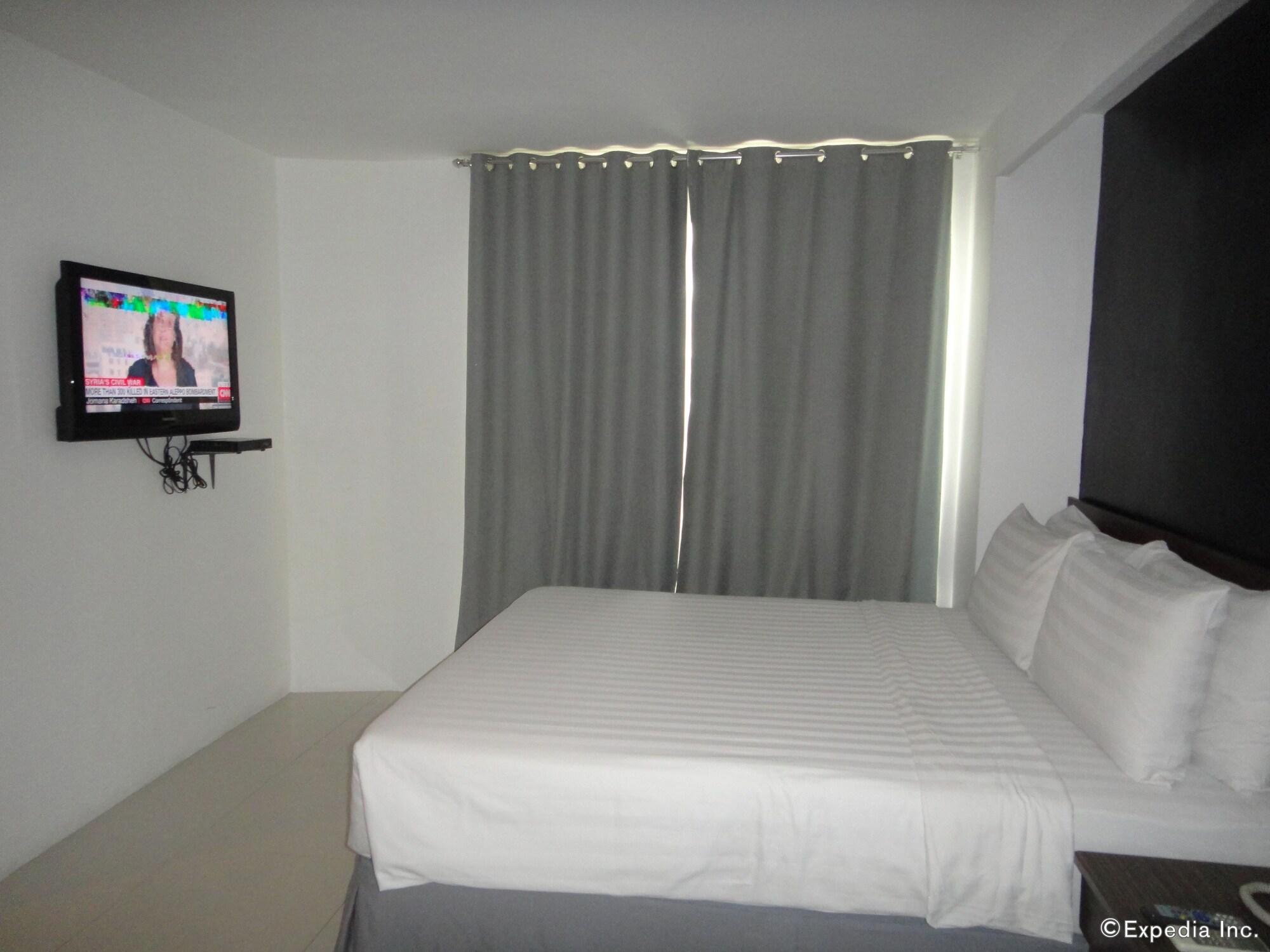 Cityscape Hotel Мандау Сити Екстериор снимка