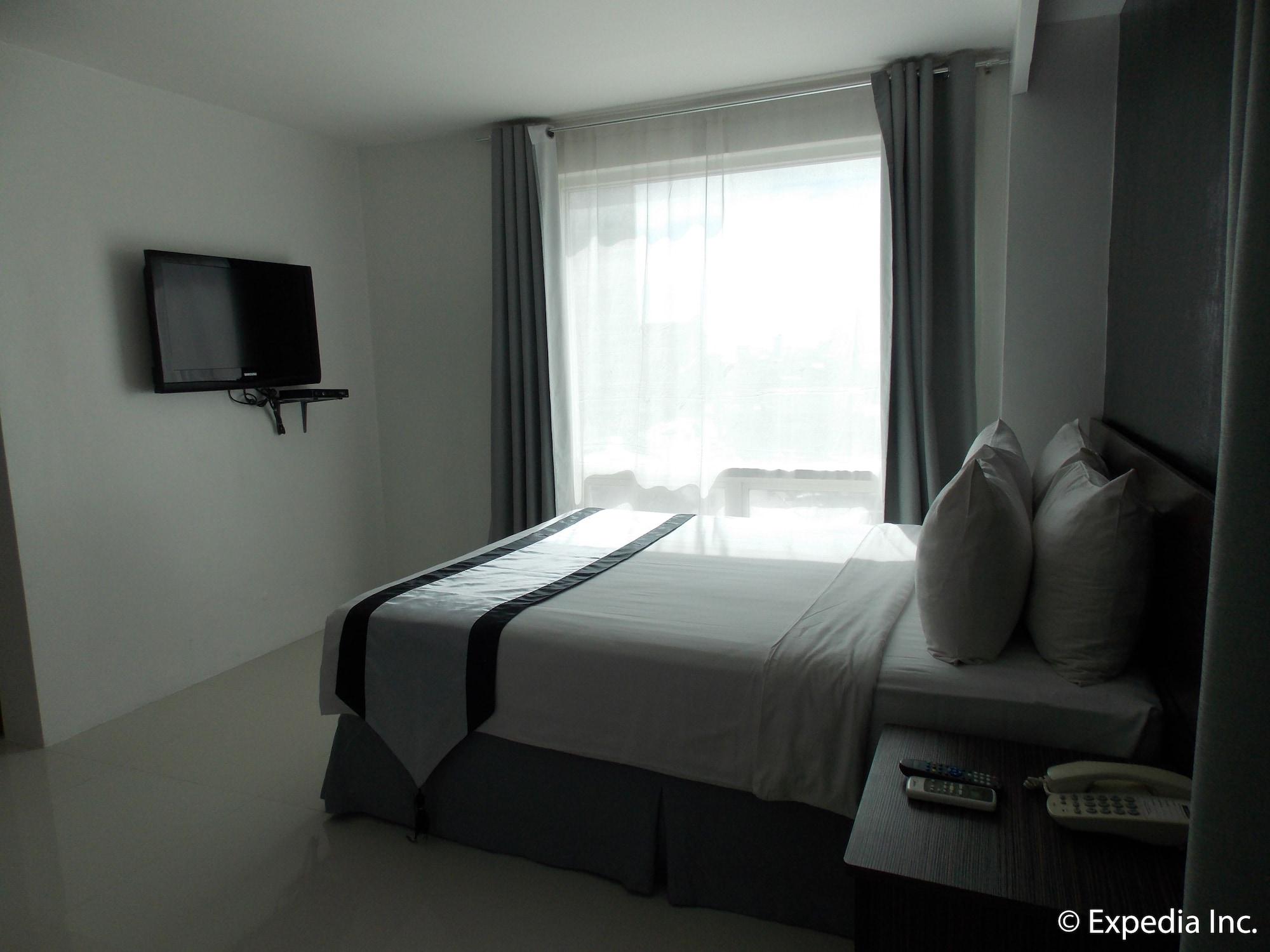 Cityscape Hotel Мандау Сити Екстериор снимка