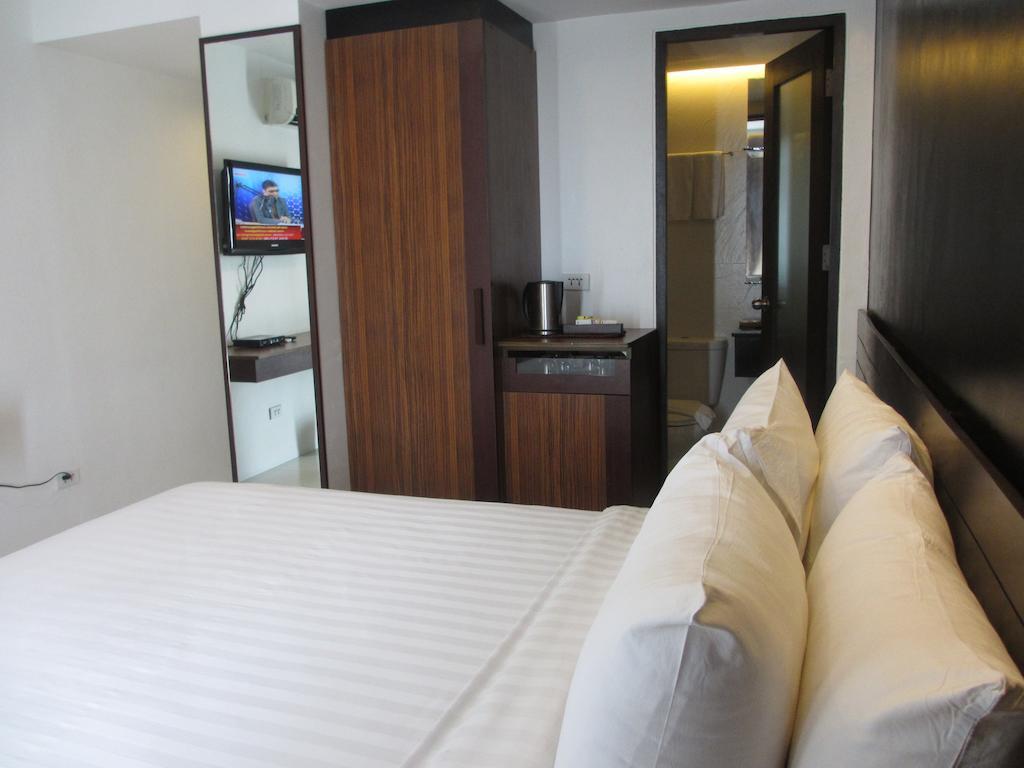 Cityscape Hotel Мандау Сити Екстериор снимка